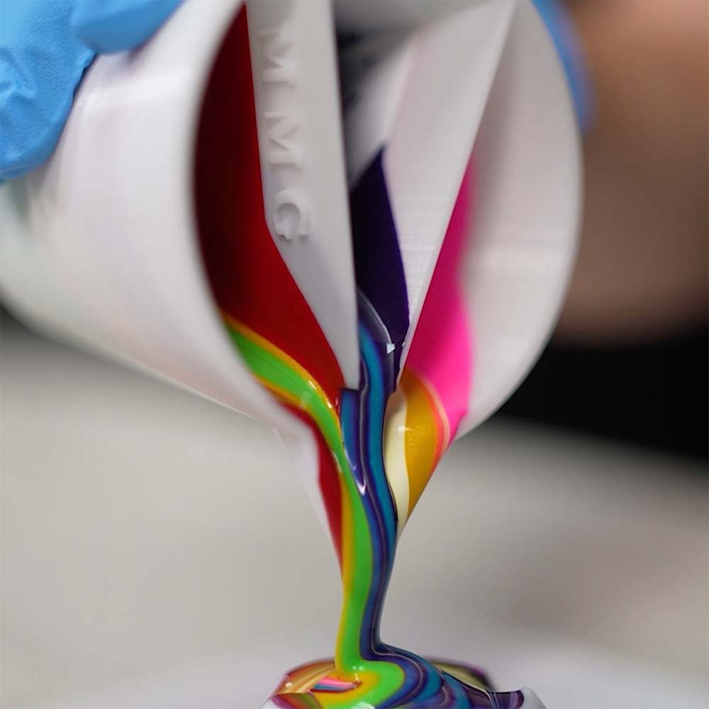 Pouring paint from a split cup